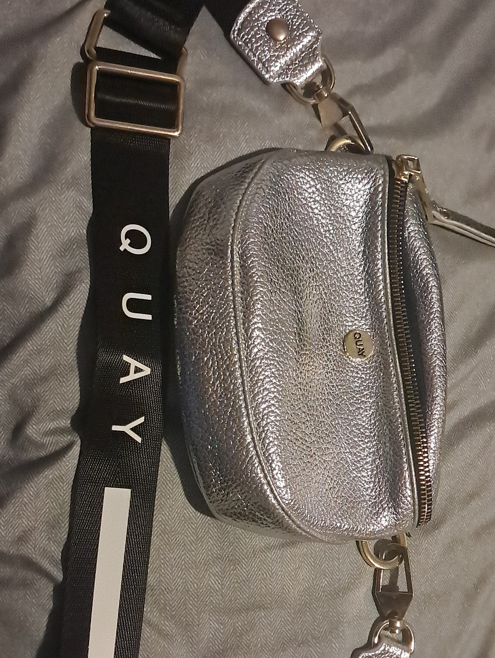 Quay Australia Metallic Silver Pebbled Crossbody with Branded Black Strap